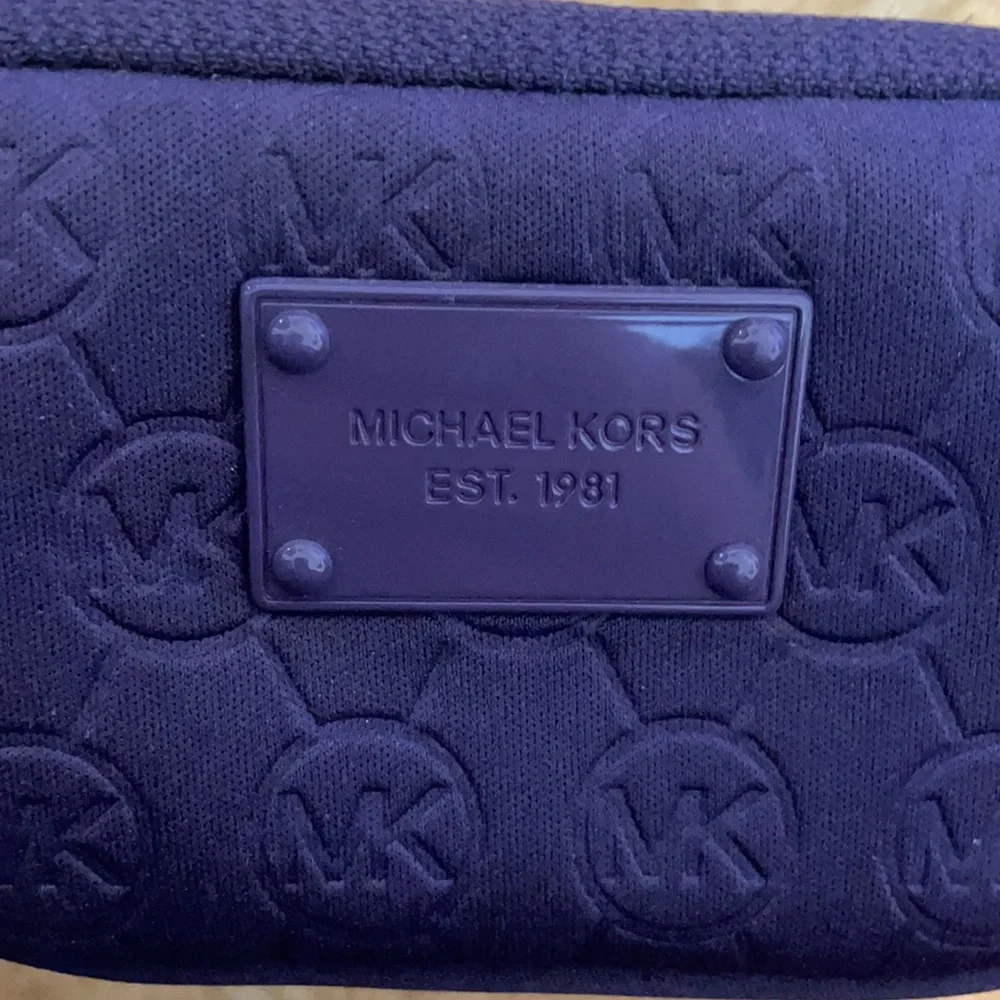Michael Kors Wrist Camera Case in purple